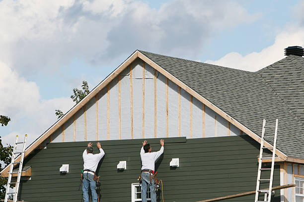 Professional Siding Contractor technician working in Clinton, OH